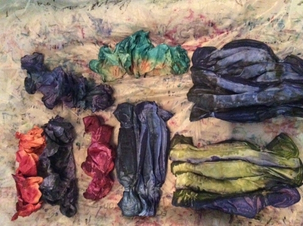 hand dyed shibori folded silk scarves drying